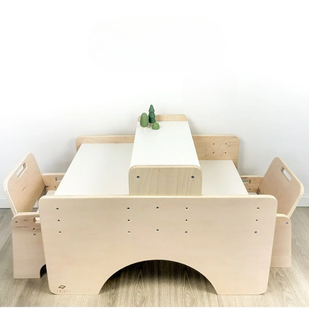 Adjustable wooden table and chair set for children, with chairs on either side of the table.