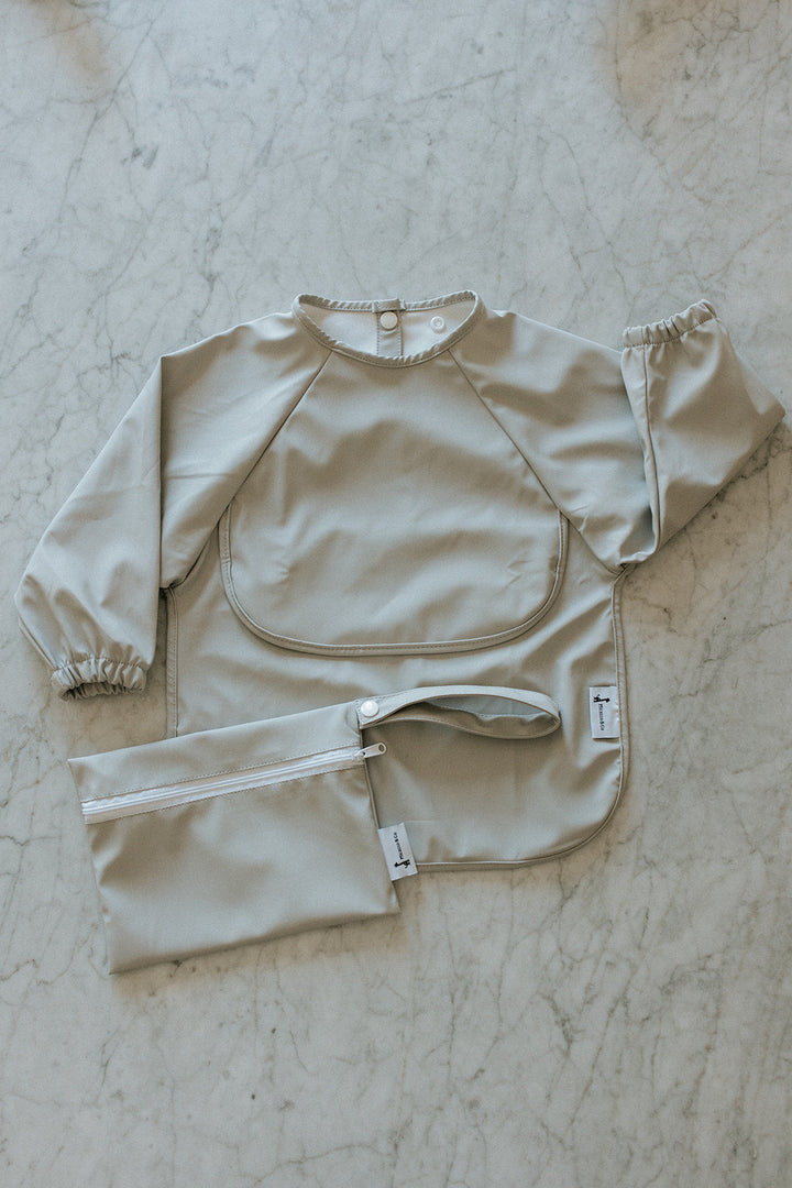 Long-sleeved bib with front pocket