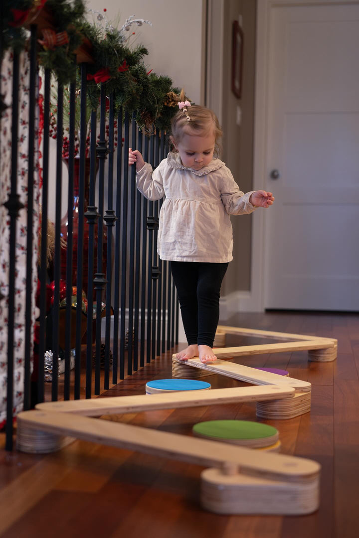 Toddler Playing With Balance Beams And Stepping Stones