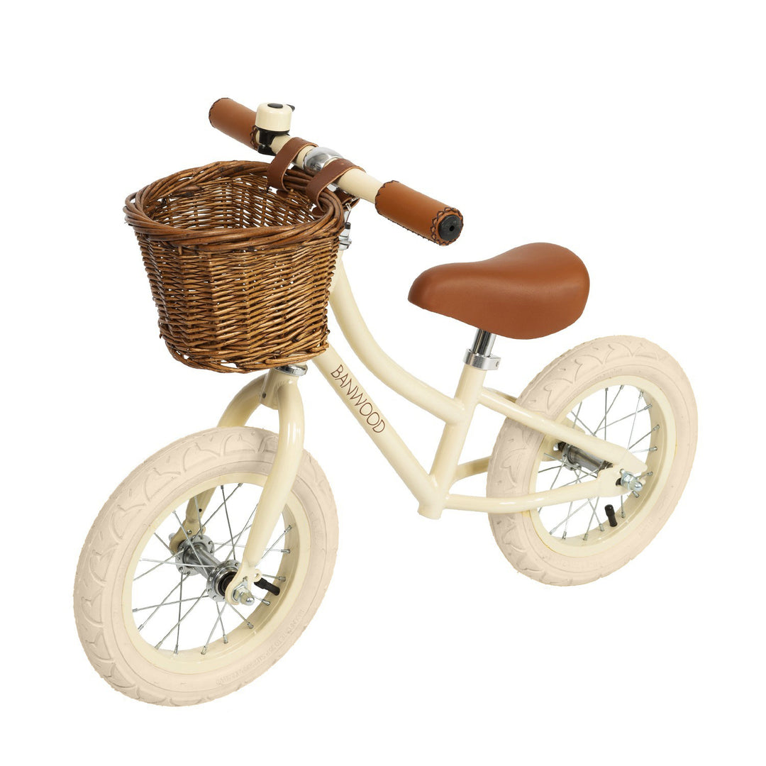 Banwood First Go balance bike Cream, front view with basket