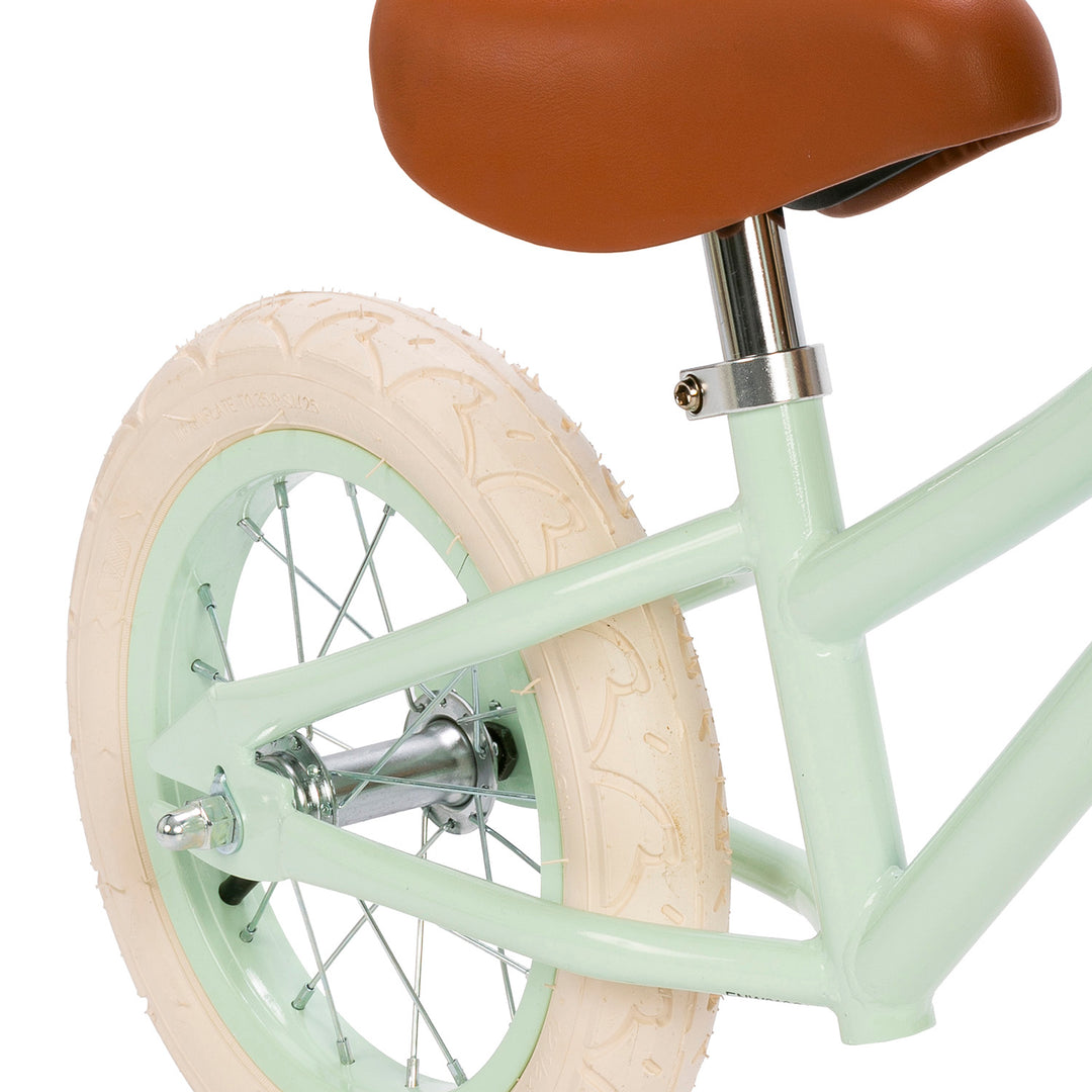 Banwood First Go balance bike Pale Mint, saddle and wheel close up