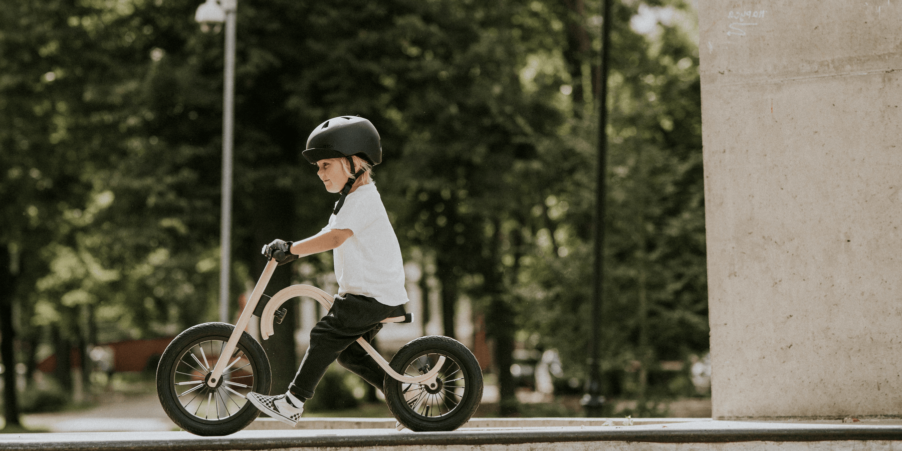 Toddler Riding A Balance Bike
