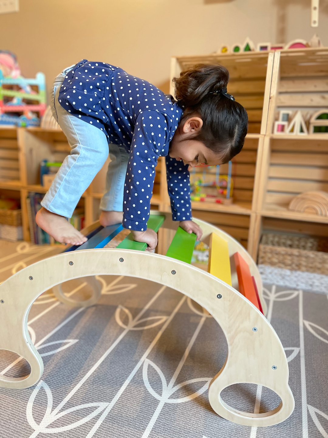 Toddler Climbing A Rocker