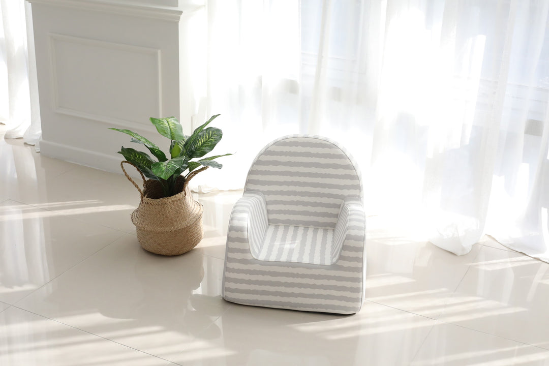 Baby Care Grey with Stripe kids sofa beside a plant