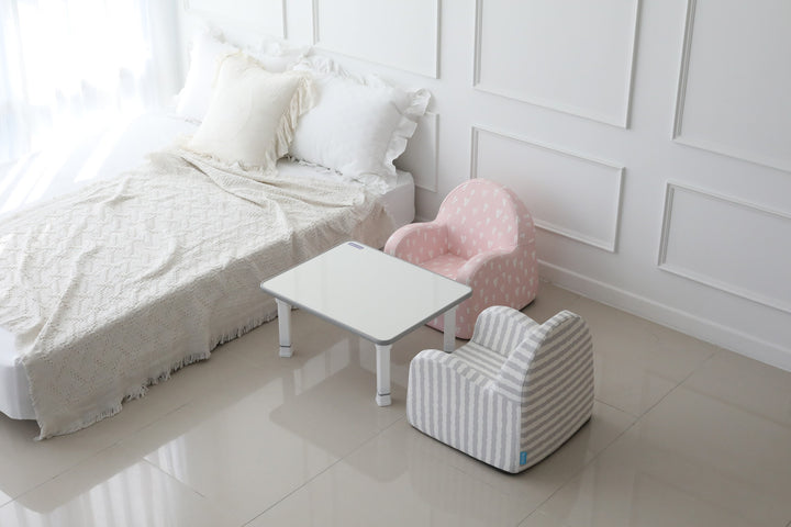 Baby Care kids sofas in Pink with Hearts and Grey with Stripe in a bedroom