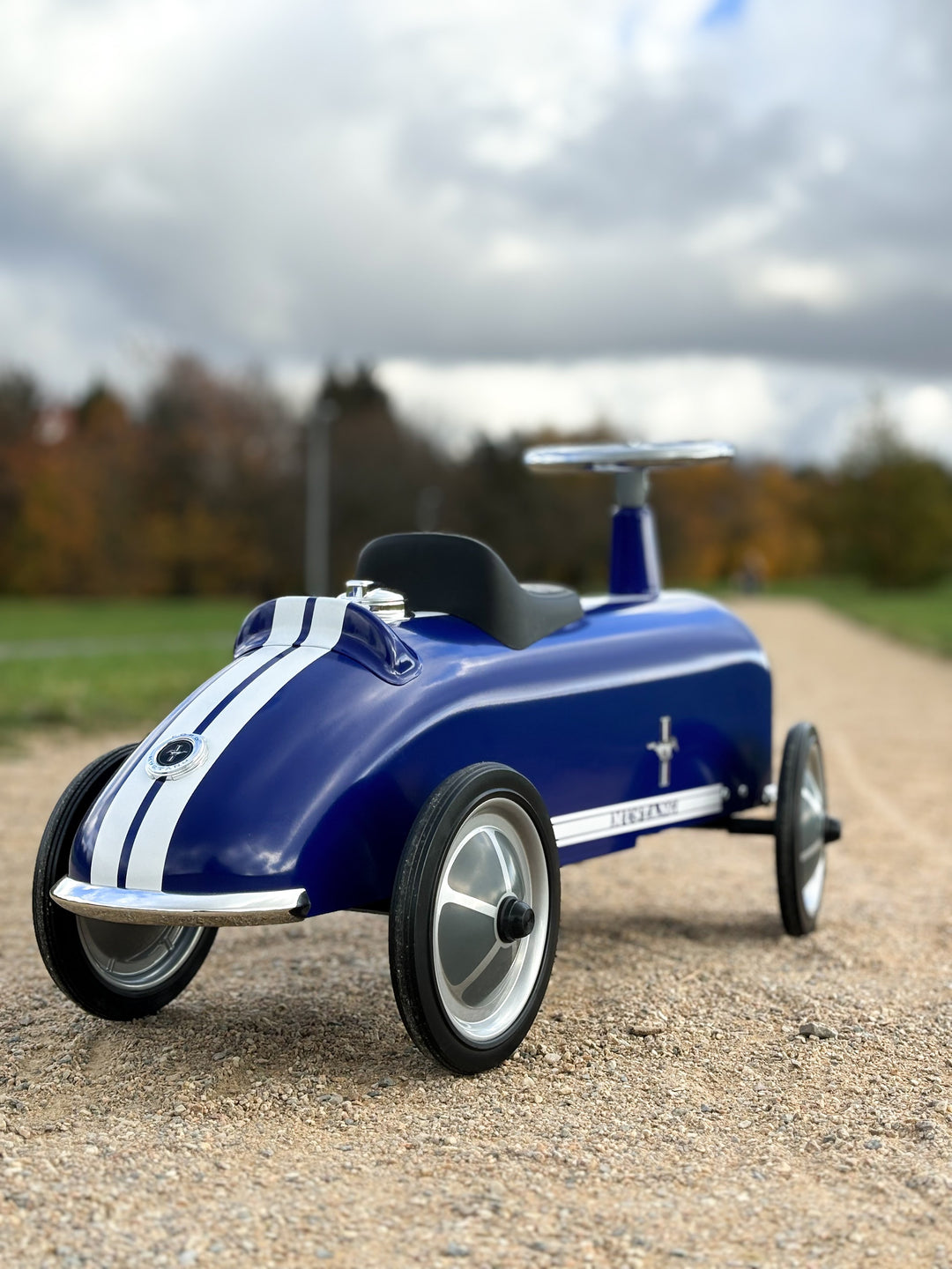 Baghera Ford Mustang ride-on car parked outdoors