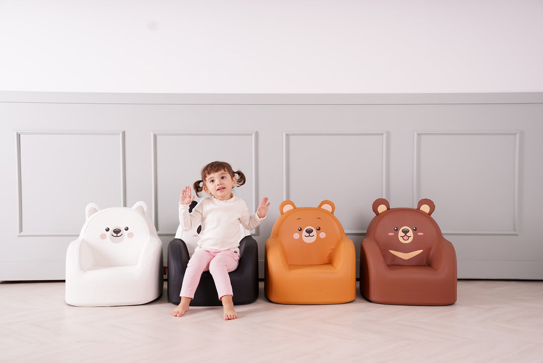 Toddler on a Dwinguler Bear Friends kids sofa