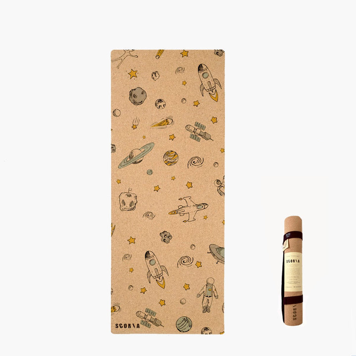 Yoga mat with space-themed design on a white background